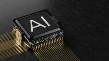 A computer chip with the letters AI printed on it
