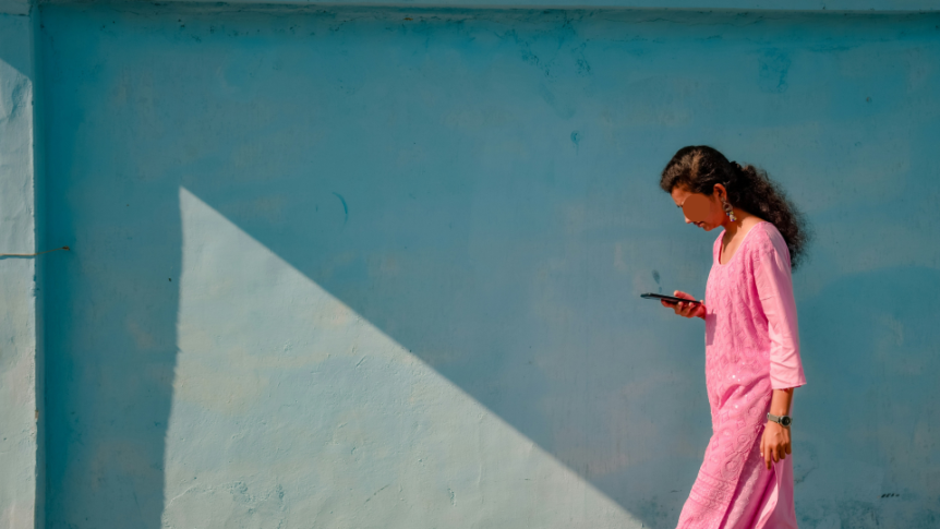 Photo: Ranjana Rajput on Unsplash (https://unsplash.com/photos/woman-in-pink-dress-standing-beside-blue-wall-fPsOipeZGNE)