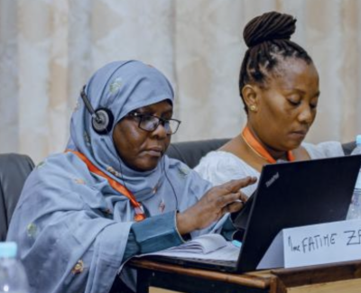 Two African women sitting at a table during this year's AfriSIG activities image linking to AfriSIG 2025: An exceptional opportunity for African professionals in internet governance 